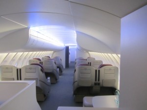 a plane with seats and tables