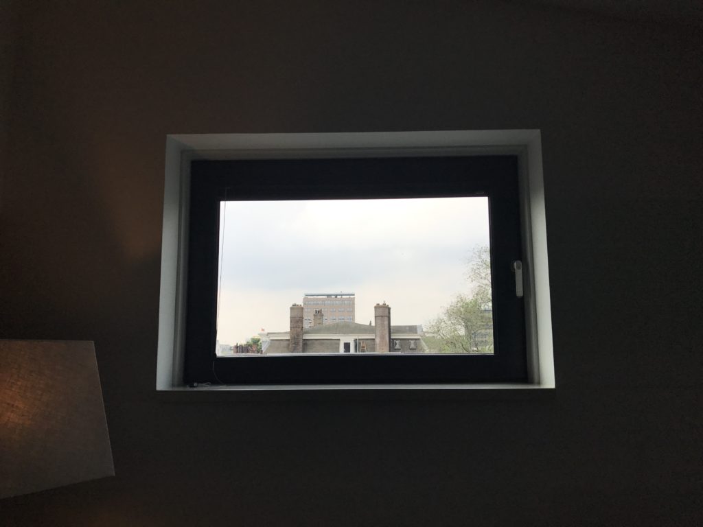 a window with a building outside