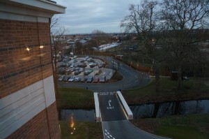 a view of a road and cars from a building