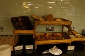 a shelf of bread on a counter