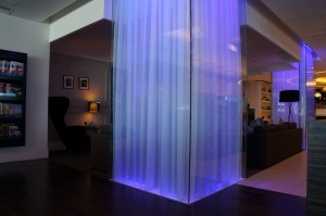 a room with a blue curtain
