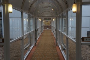 long hallway with glass windows