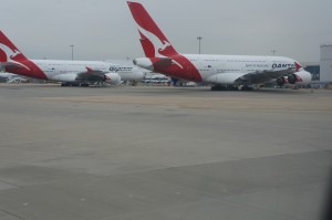 Taxi past 2 Qantas A380s