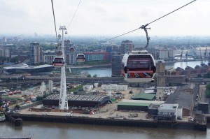 a cable car going over a city