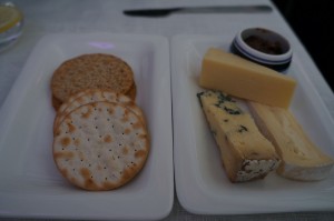 a plate of cheese and crackers
