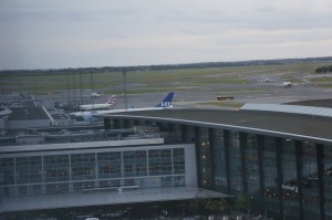 an airport with planes on the roof