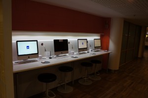 a row of computers on a table