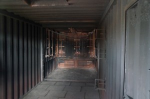 a dark room with metal walls