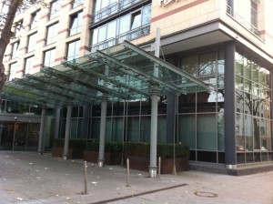 a glass covered entrance to a building