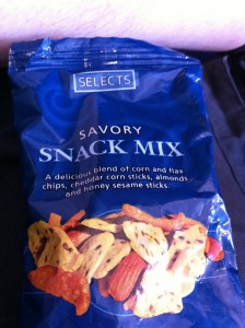 a blue bag of savory snack mix
