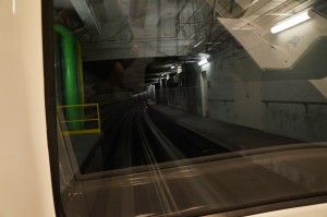 a train tracks in a tunnel