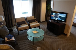 a room with a television and a table