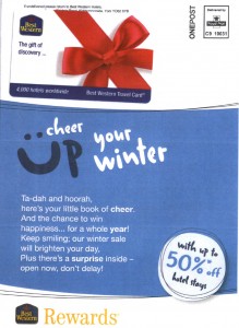 a blue and white gift card with a red bow