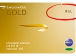 a gold card with a red circle and a red circle