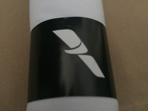 a roll of paper towels with a logo on it