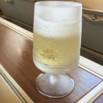 a glass of liquid on a table