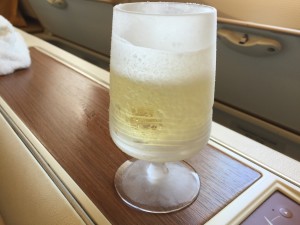 a glass of liquid on a table