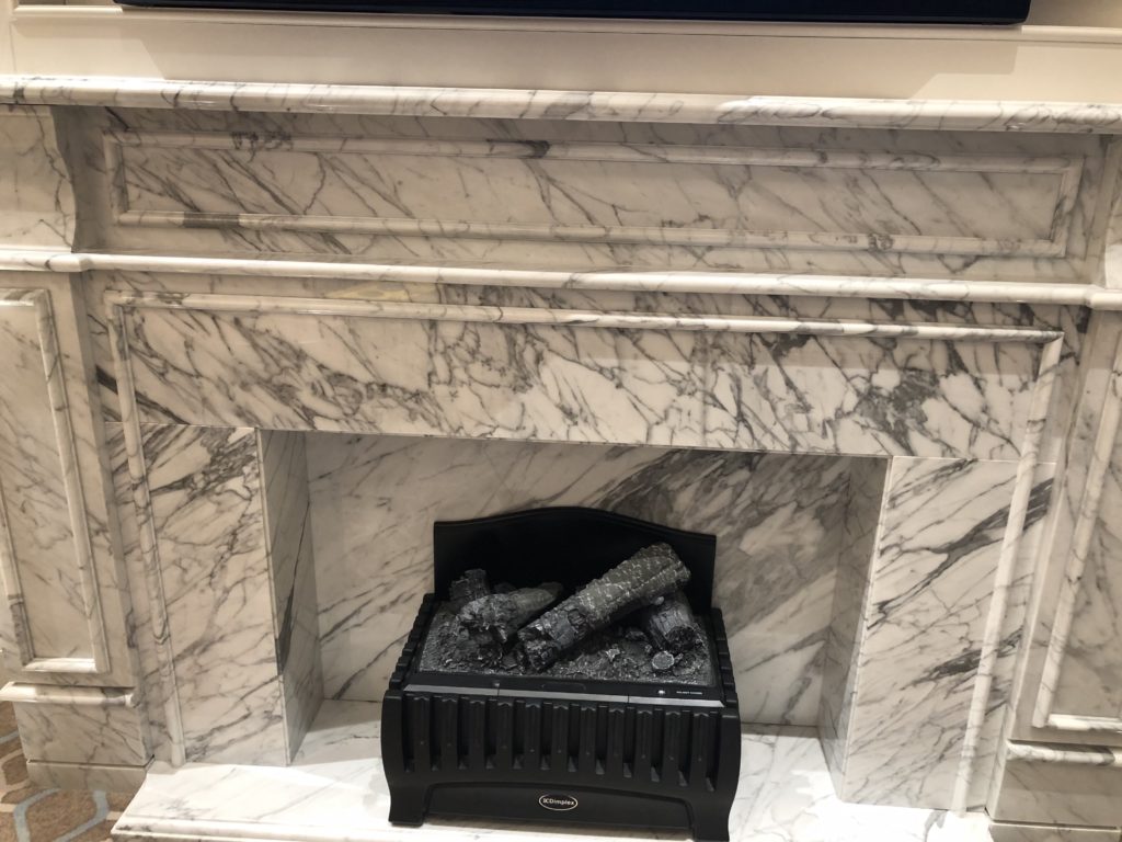 a fireplace with logs in it